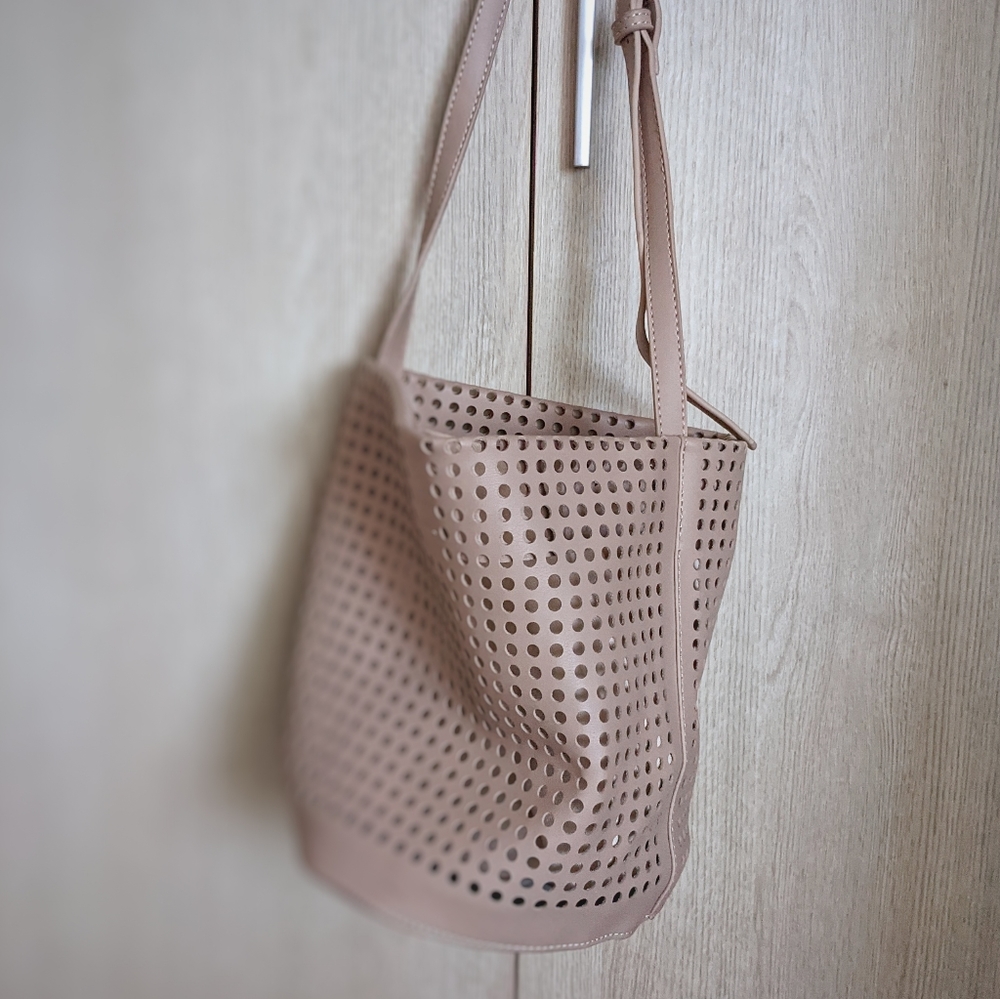 Nude vegan leather perforated bucket bag
